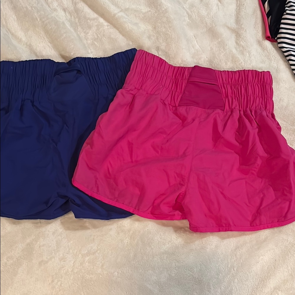 Two pairs of NWT Ladies S Boutique Shorts. Never worn, beautiful bright colors